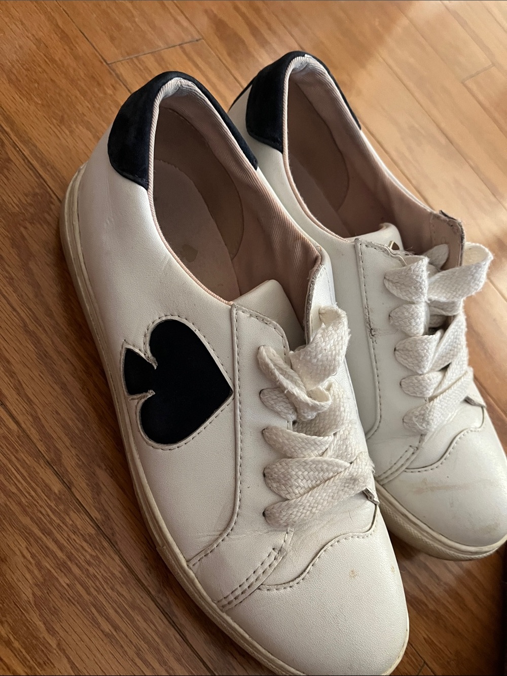 kate spade White Leather Sneakers with Black Heart Accent
